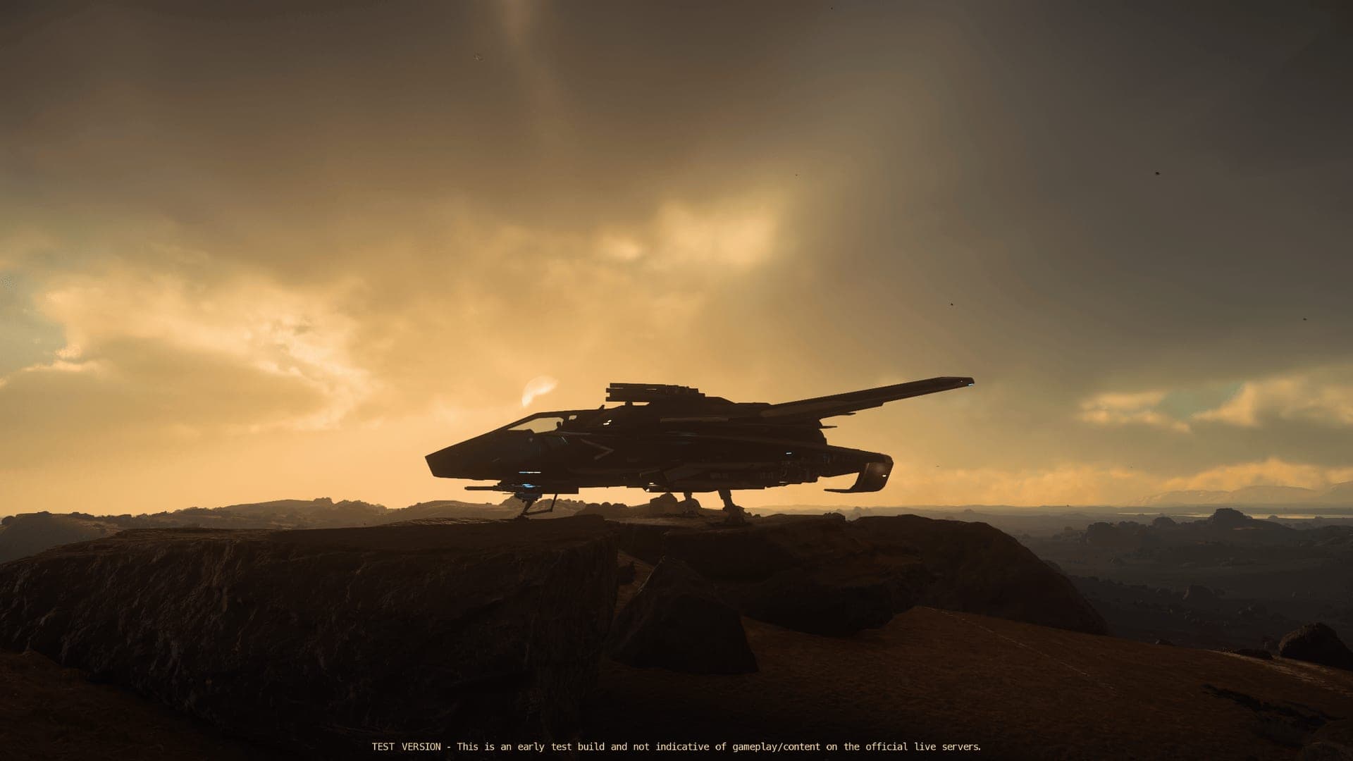 A starship silhouetted against a golden sunset on a mountain ridge